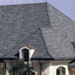 Close-up of a grey tiled roof.