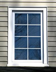 White window with six panes on a house.